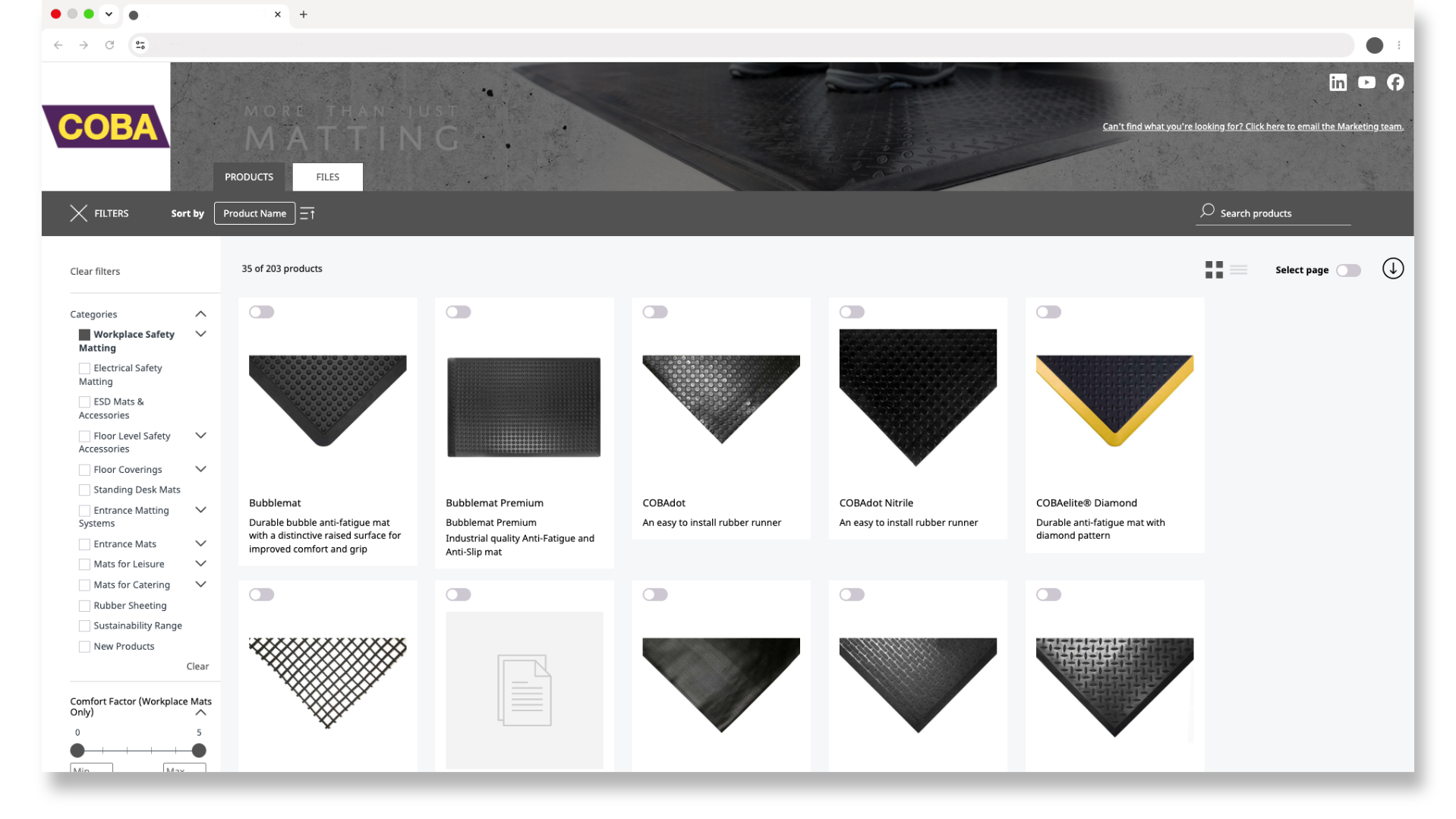 Captura de pantalla del catálogo de productos COBA que muestra alfombras de seguridad para el lugar de trabajo, opciones de filtro, tarjetas de productos y una barra de búsqueda.