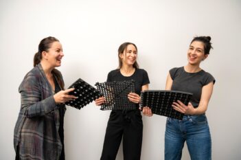 COBA team holding mats