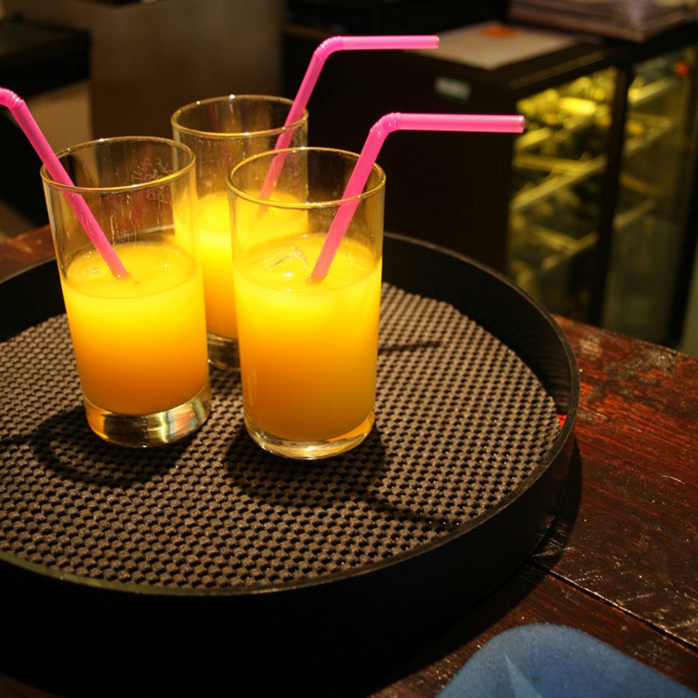 drinks-resting-on-a-tray-lined-with-gripsafe-anti-slip-surface