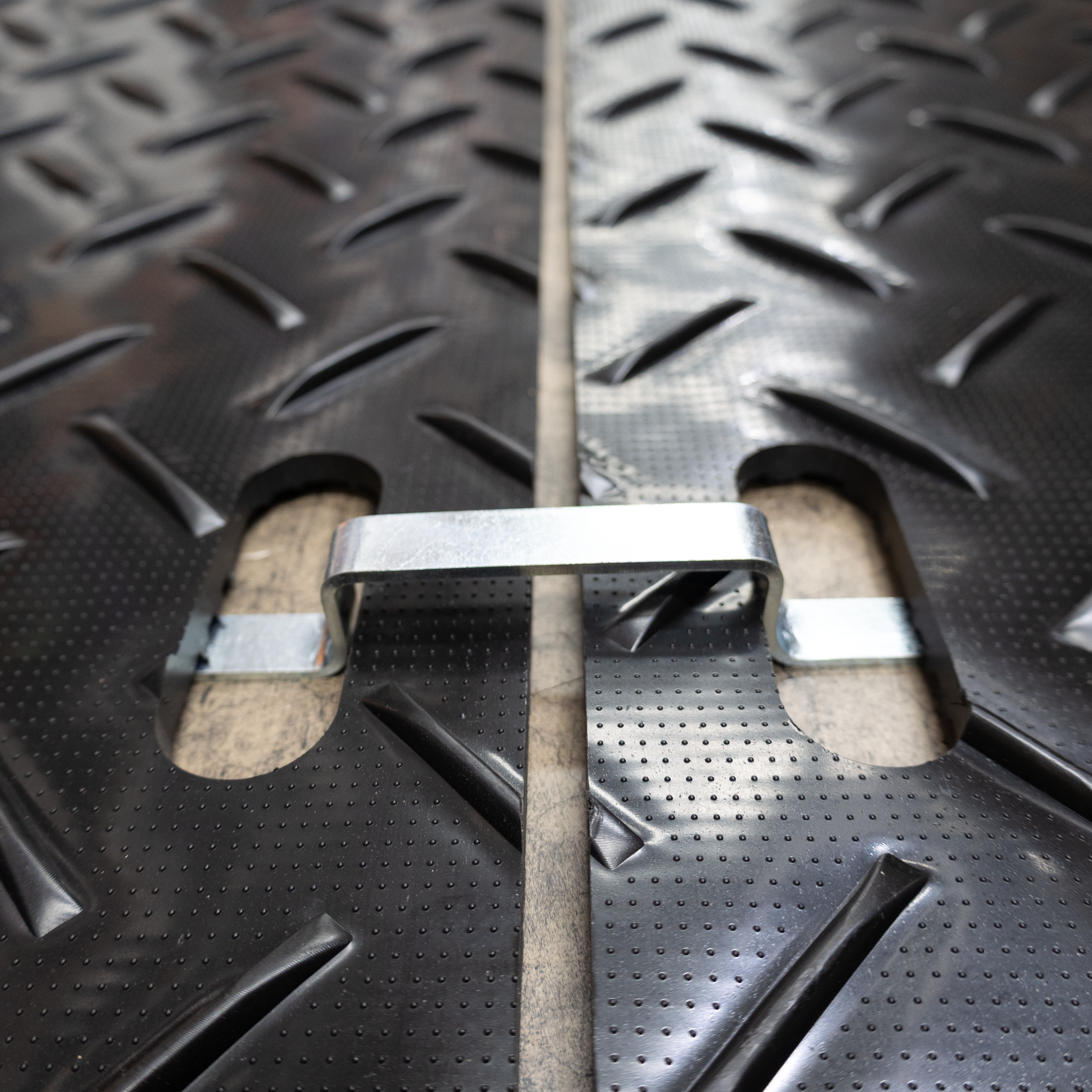 Close up of the metal connectors combining the CoBATrack mats together