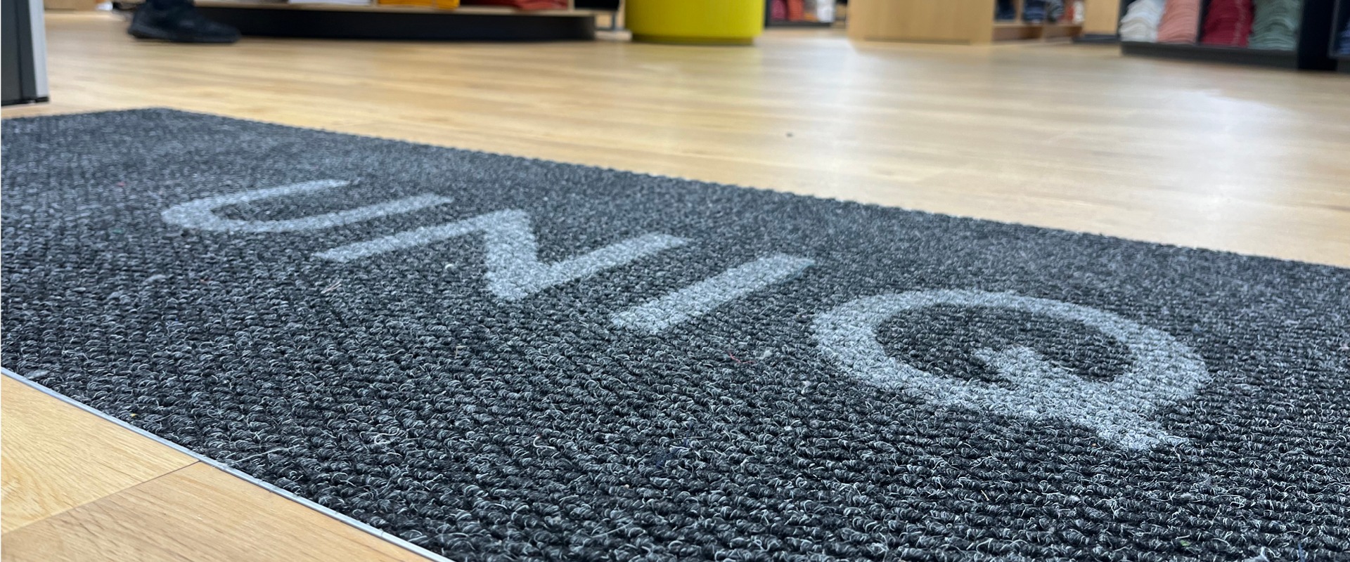 UNIQ - Spectra Clean logo mat