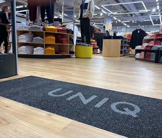 UNIQ - Spectra Clean logo mat