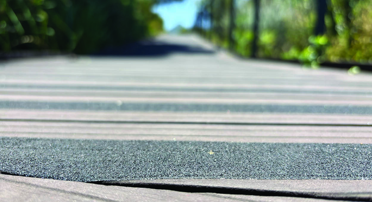 Anti-slip tape for outdoor walkways